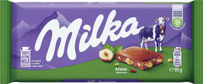 MILKA TABLETA DE CIOCOLATA CU ALUNE DE PADURE 90G